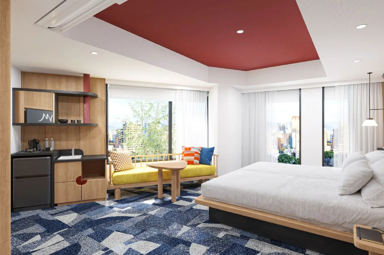 Accor Unveils Its First Mercure In Hiroshima And The Second Dual-Branded Collaboration In Japan 3 Spacious guest room at Mercure Tokyu Stay Hiroshima featuring modern Japanese-inspired design, large windows and seating area.