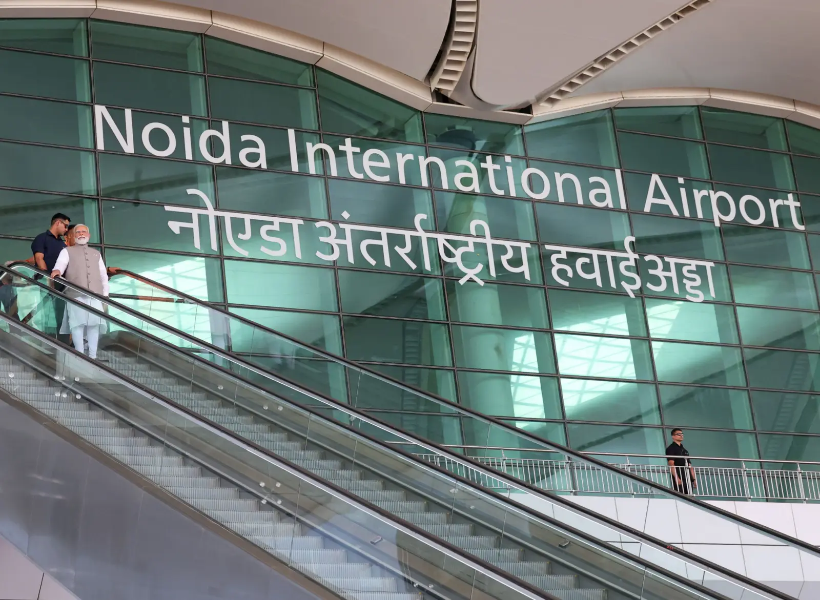 India’s Newest Airport Noida International Officially Opens, Intends To Relieve Pressure On Delhi’s Indira Gandhi International 3 Indian Prime Minister Narendra Modi on escalator at Noida International Airport inauguration