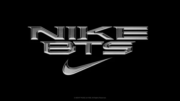 Metallic Nike BTS collaboration logo on a black background promoting the BTS World Tour Arirang collection.