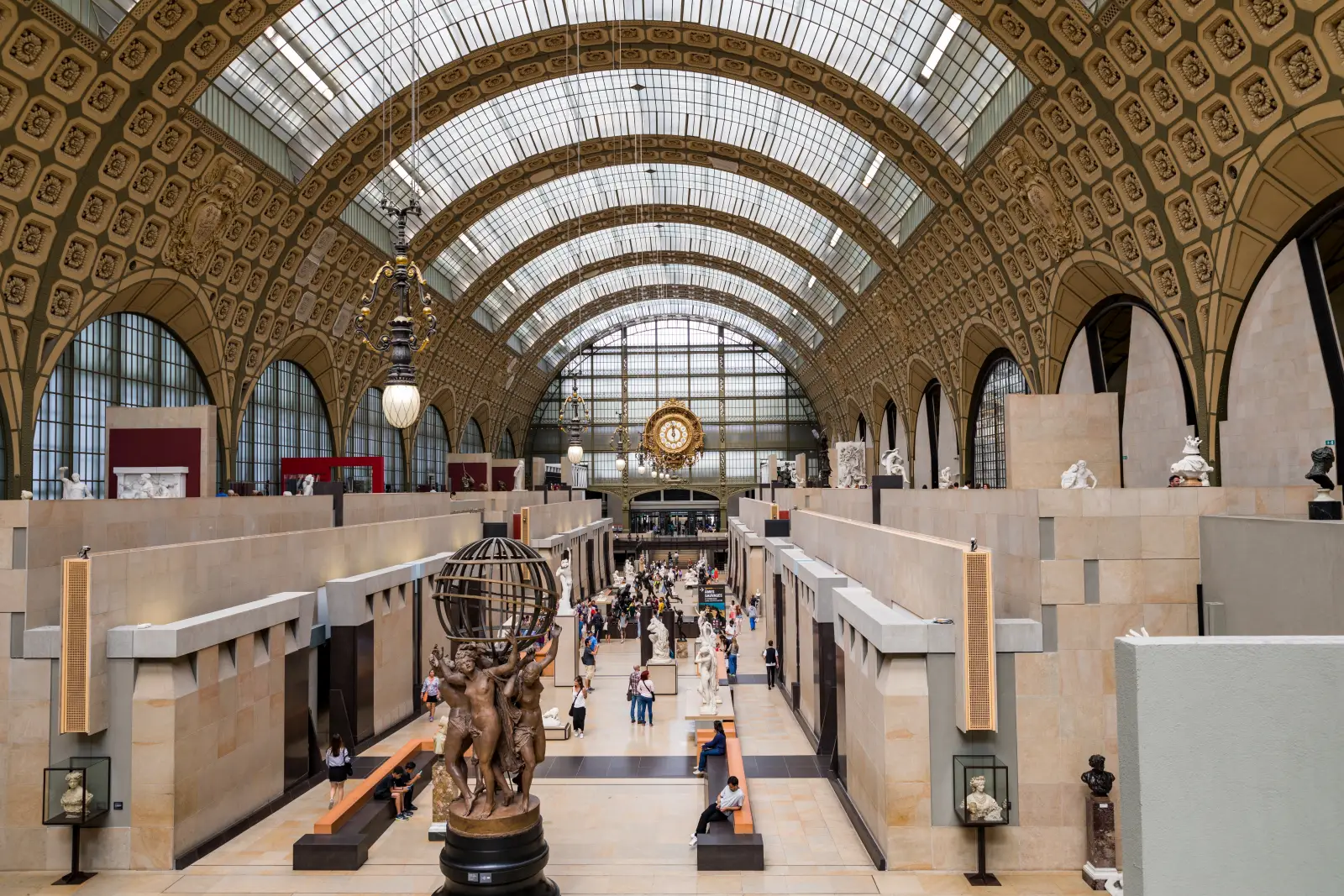 2026'S Top Museum Cities Ranked 7 Interior view of the Musée d'Orsay in Paris with sculptures, vaulted glass ceiling and visitors walking through the gallery hall
