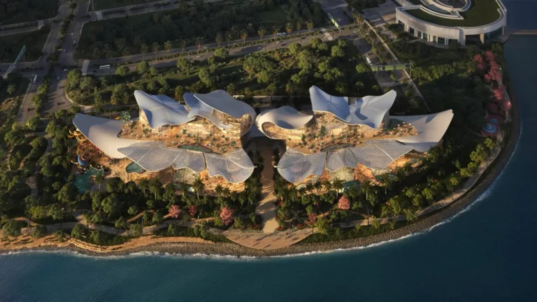 Health &Amp; Wellness Tourism 5 Aerial rendering of Therme Singapore at Marina South, showcasing the future integrated wellbeing destination with organic architecture, pools, gardens and waterfront surroundings.