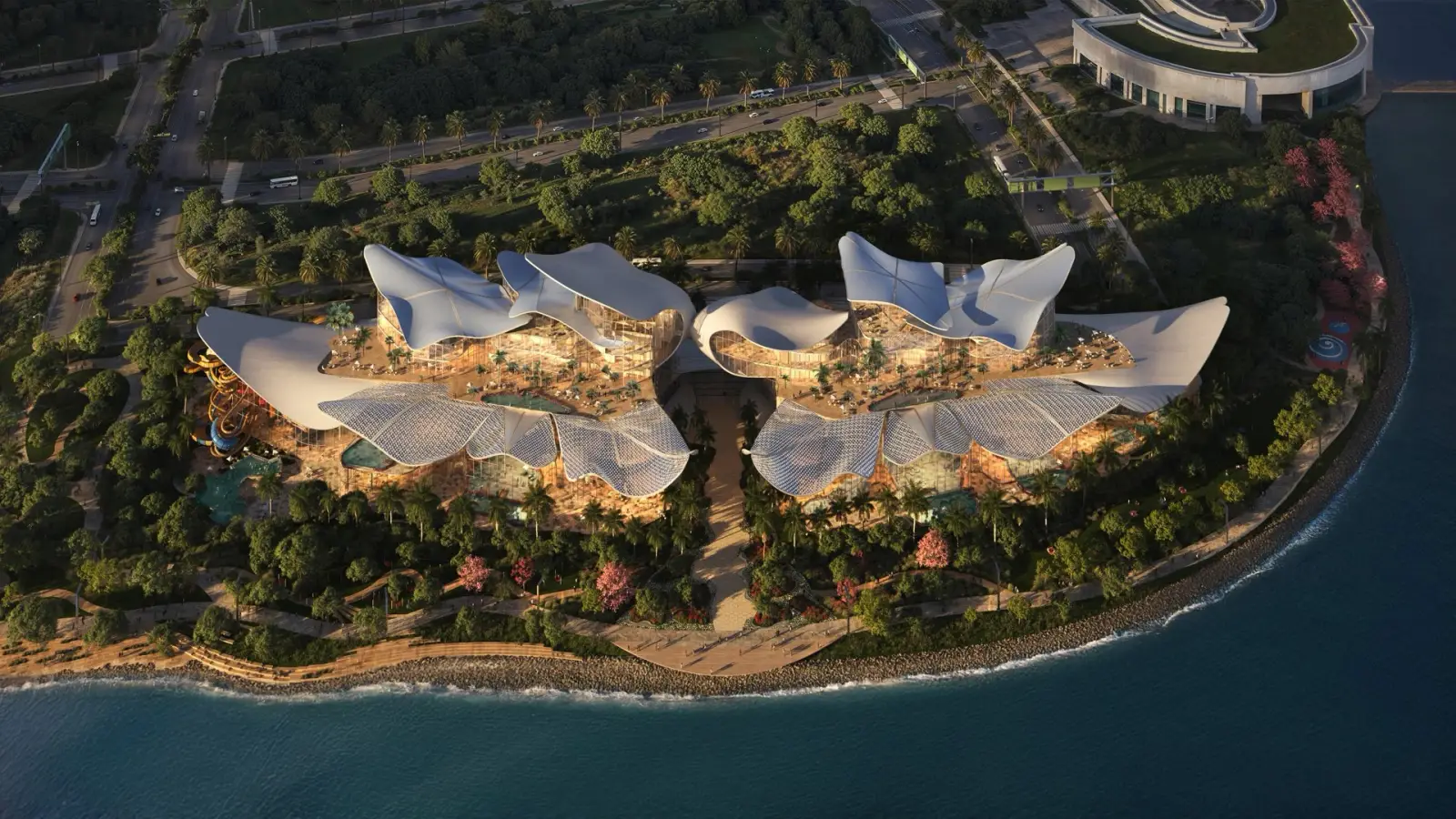 Aerial rendering of Therme Singapore at Marina South, showcasing the future integrated wellbeing destination with organic architecture, pools, gardens and waterfront surroundings.