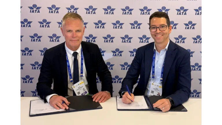 Executives from WestJet and Icelandair sign a reciprocal codeshare agreement at the IATA AGM 2026
