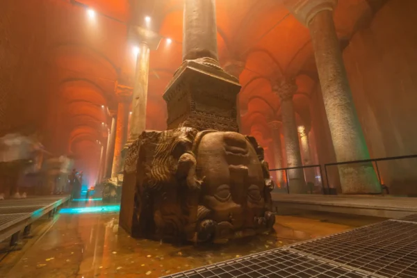 Medusa head at the base of a column inside the Basilica Cistern, Istanbul.