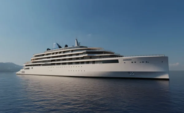 News 32 Exterior view of Aman at Sea's Amangati luxury yacht cruising on calm waters, showcasing its sleek modern design ahead of its Mediterranean and Caribbean debut.