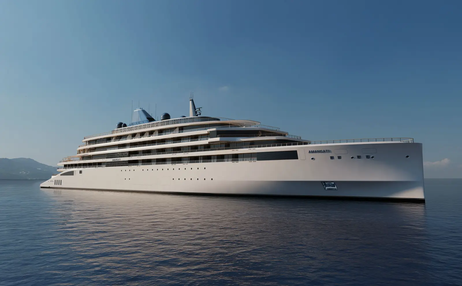 Aman At Sea’s Amangati To Debut In The Caribbean Following Inaugural Mediterranean Season In 2027 5 Exterior view of Aman at Sea's Amangati luxury yacht cruising on calm waters, showcasing its sleek modern design ahead of its Mediterranean and Caribbean debut.