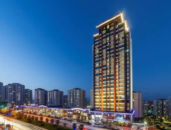 News 33 Exterior night view of Radisson Residences Avrupa TEM Istanbul, a modern high-rise hotel and serviced residence with illuminated façade in Istanbul, Türkiye.