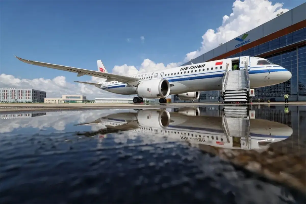 China'S C919 To Begin International Service From 12 August, Air Cambodia Buys Comac Planes 4 An Air China COMAC C919 passenger aircraft is parked outside a COMAC facility ahead of its deployment on international routes.