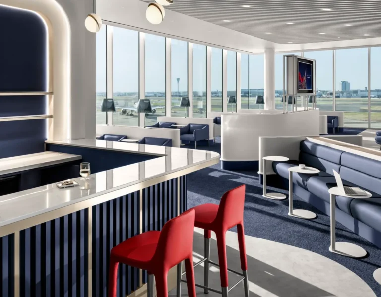 Aviation 12 Interior of the new Air France lounge at London Heathrow Terminal 4 featuring runway views, premium seating and a stylish bar area.