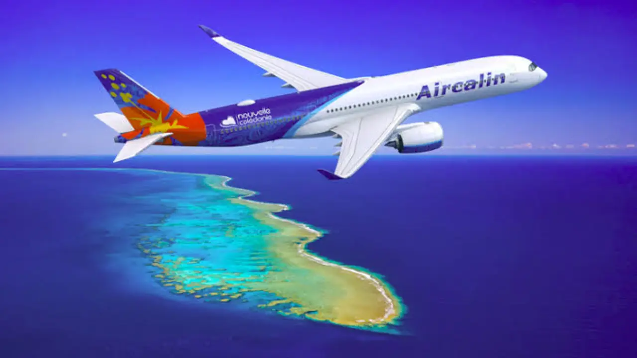 New Caledonia’s Aircalin Reveals New Branding 3 An Aircalin A350 aircraft in flight above a coral reef and ocean, featuring the airline's livery with New Caledonia branding on the tail