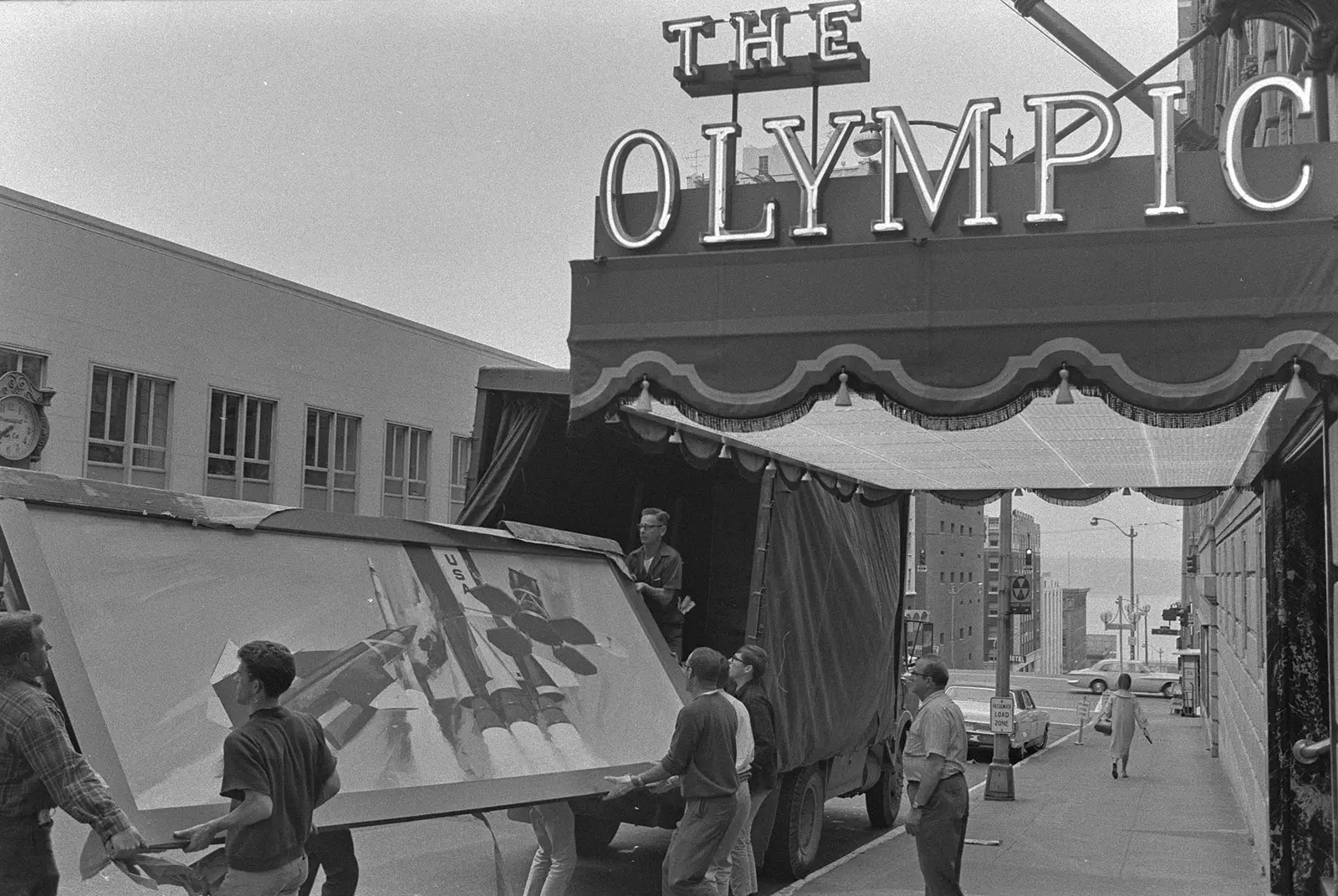 The Boeing Company Marks 110 Years 4 Workers install Boeing anniversary artwork outside Seattle's Olympic Hotel during the company's 50th anniversary celebrations in 1966.