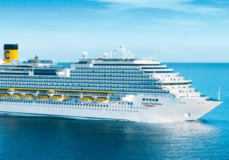 Costa Diadema cruise ship sailing across calm blue water