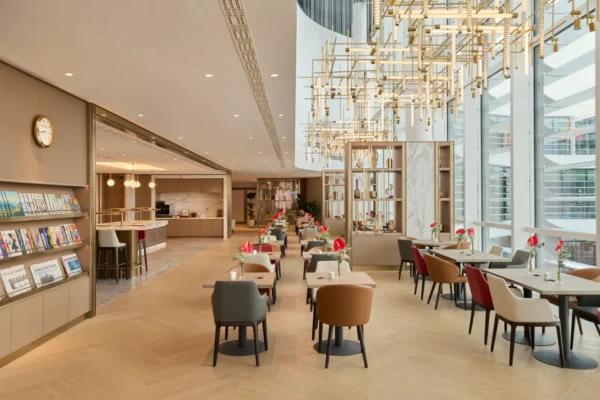 Home 8 Interior of the new Emirates next generation lounge in Munich featuring spacious dining areas, premium seating and contemporary design.