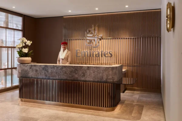 Home 10 Reception area of the new Emirates next generation airport lounge in Munich featuring contemporary luxury interior design.