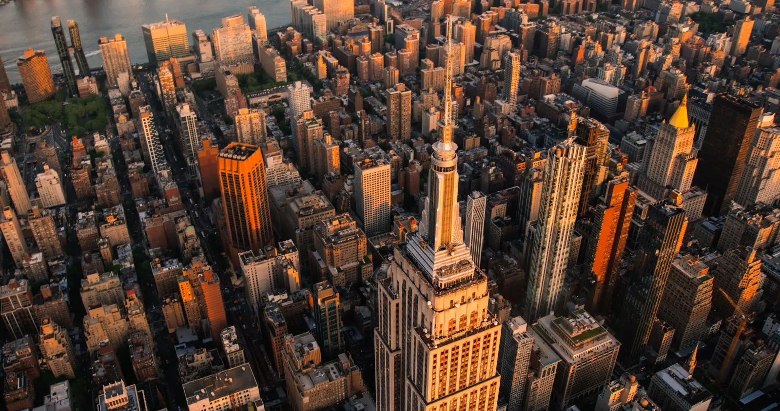 Couple Climbs Empire State Building, Gets Engaged, Faces Charges 4 Aerial view of the Empire State Building and Manhattan skyline at sunset