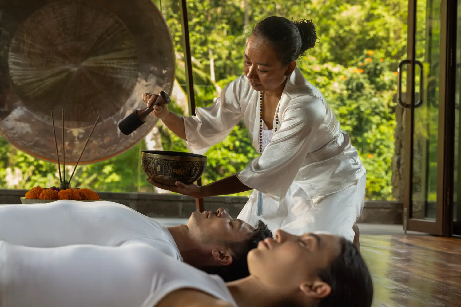 Beyond The Gen Z Myth: Four Distinct Luxury Mindsets Reshaping Travel In Asia Pacific 4 Wellness guests take part in a sound healing session at a luxury spa, reflecting the Future Proofer travel mindset focused on preventive health and holistic wellbeing.