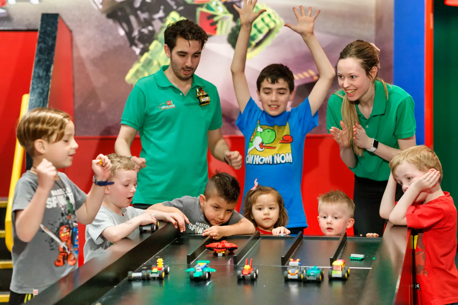 Legoland Discovery Center Dallas Offers Free Tickets For Teachers This July 3 Children race LEGO vehicles during the LEGO Racers Build and Test experience at LEGOLAND Discovery Center Dallas, guided by attraction staff.