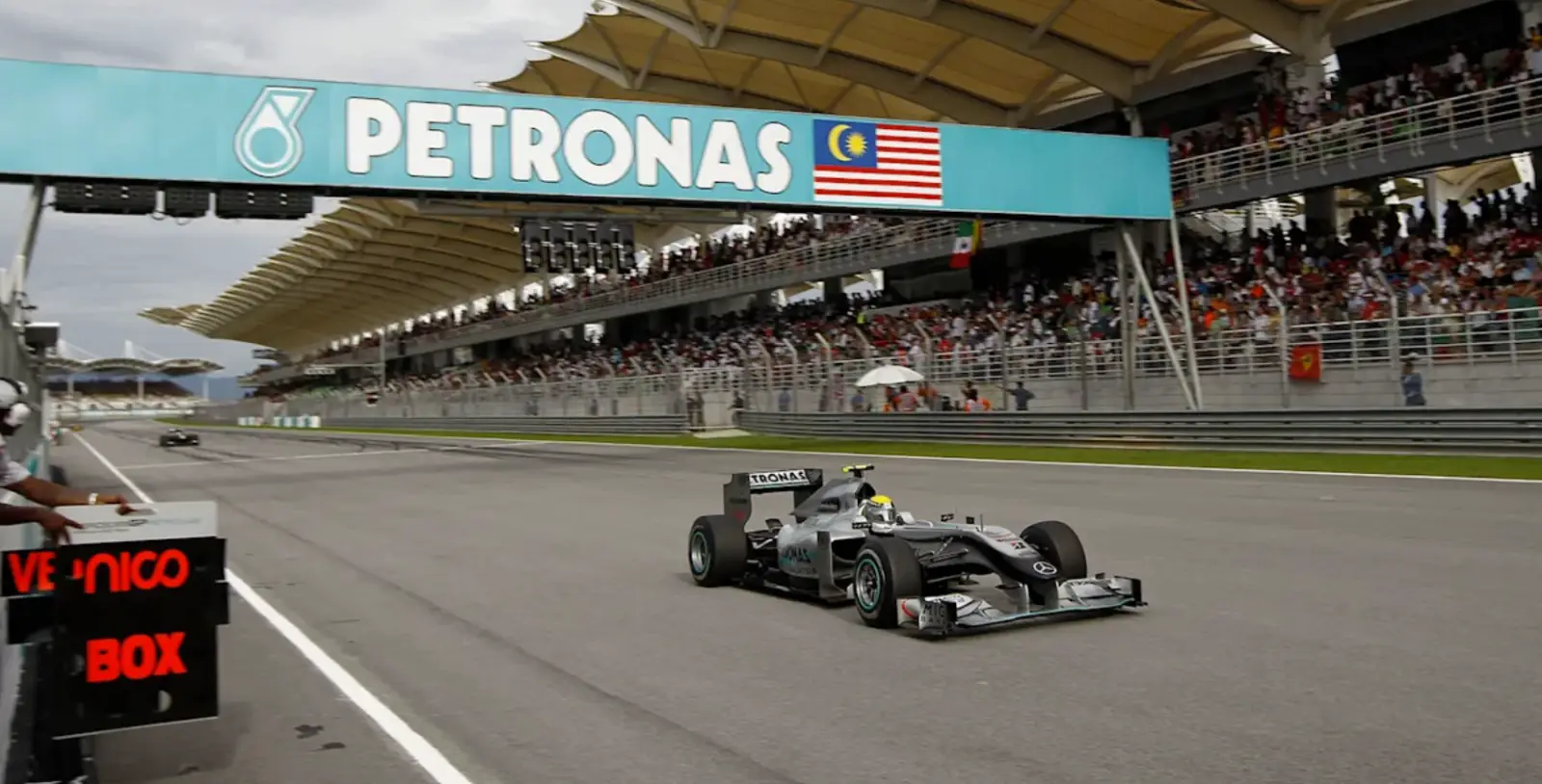Mercedes Formula 1 car on the main straight at Sepang International Circuit during a race weekend