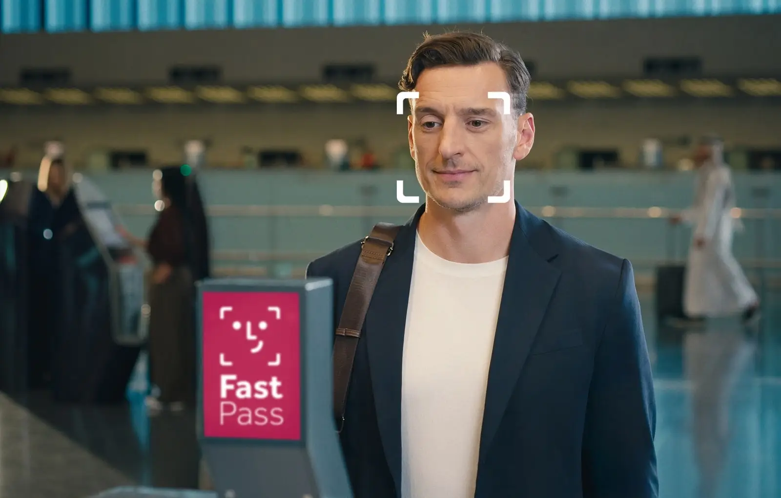Qatar Airways And Hamad International Airport Launch Fast Pass Biometric Facial Recognition 5 Passenger using Qatar Airways Fast Pass facial recognition system at Hamad International Airport for biometric identity verification.