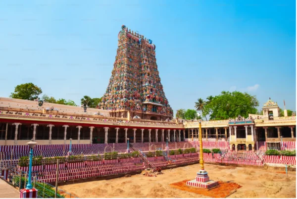 Home 5 Ramanathaswamy Temple in Rameswaram, India, featuring its colorful gopuram and temple courtyard under a clear blue sky.