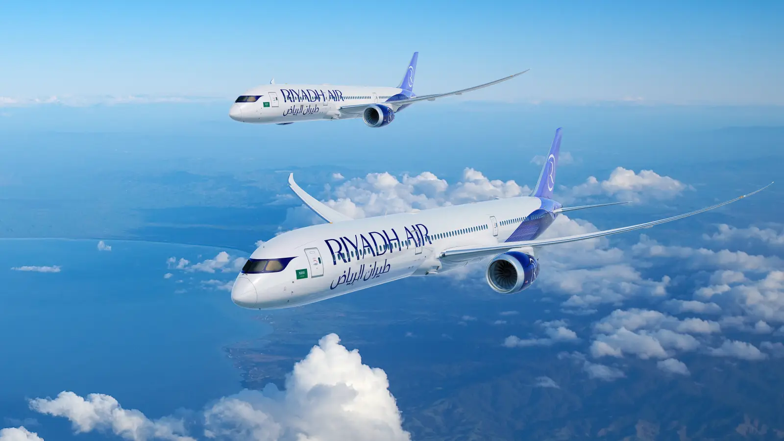 Riyadh Air Orders 28 More Boeing 787S To Expand Global Network 6 Two Riyadh Air Boeing 787 Dreamliner aircraft fly above clouds, highlighting the airline's expanding long haul fleet.