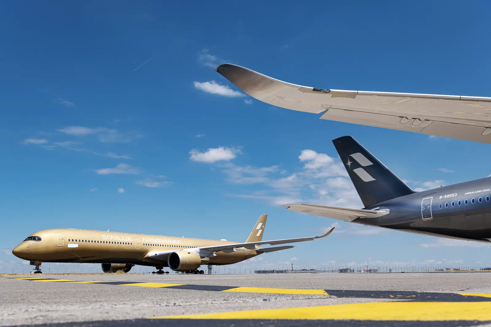 Starlux Chairman Pilots Airsorayama Silver On Maiden Flight From Toulouse To Taipei 3 STARLUX AIRSORAYAMA Gold and AIRSORAYAMA Silver Airbus A350-1000 aircraft displayed together during the delivery ceremony in Toulouse.