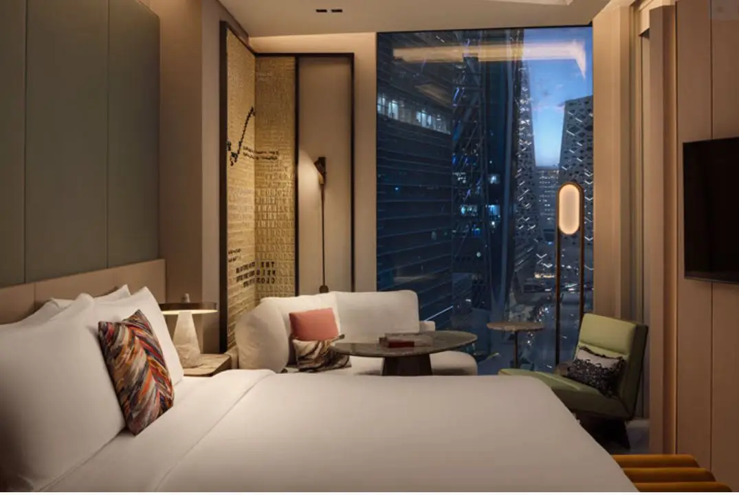 W Hotels Makes Its Debut In Saudi Arabia With The Opening Of W Riyadh 4 Guest room at W Riyadh KAFD with modern design, floor-to-ceiling window and city views.